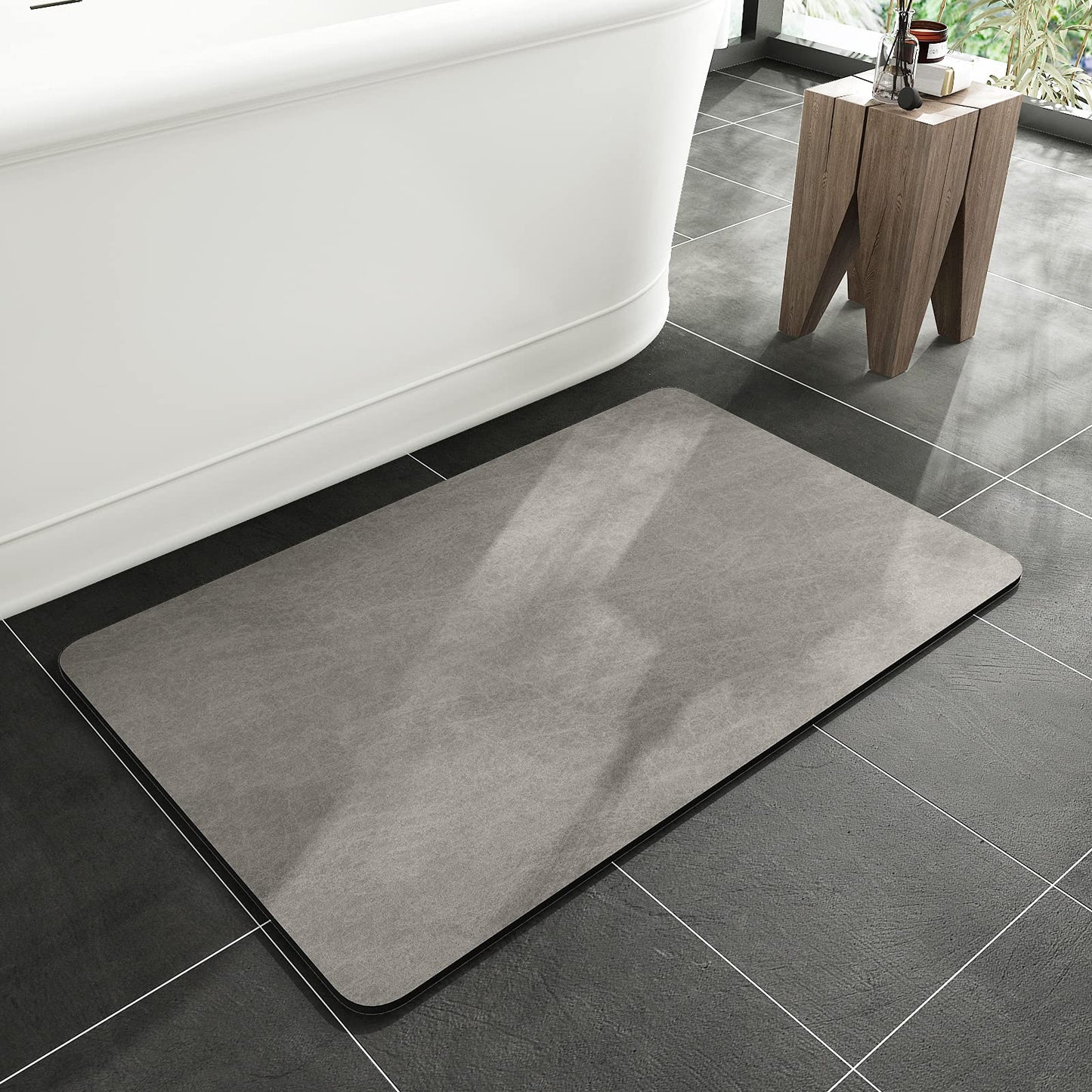 Les tapis de salle de bain s'adaptent en dessous